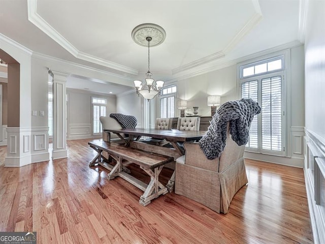 139 Grandmar Chase, Canton, GA 30115 - interior space with a decorative wall, a wainscoted wall, decorative columns, light wood-type flooring, and a notable chandelier