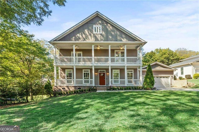 435 Webb Dr, Norcross, GA 30071 - view of front facade with a front yard, a porch, a ceiling fan, and a garage