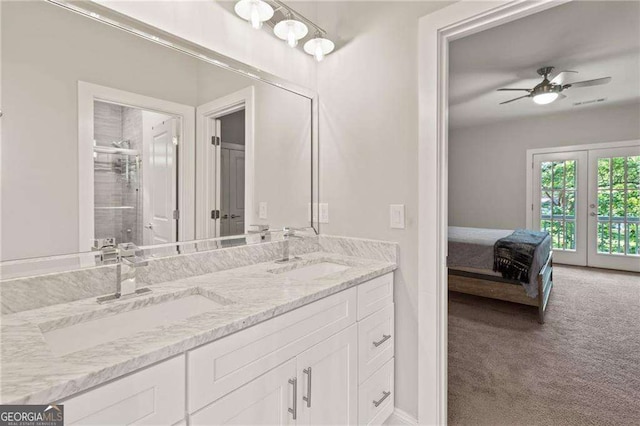 435 Webb Dr, Norcross, GA 30071 - ensuite bathroom with a ceiling fan, a shower with door, double vanity, and a sink