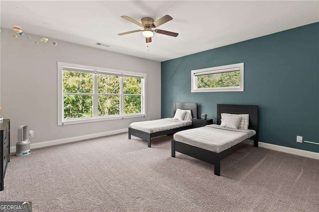 435 Webb Dr, Norcross, GA 30071 - carpeted bedroom featuring baseboards, ceiling fan, and visible vents