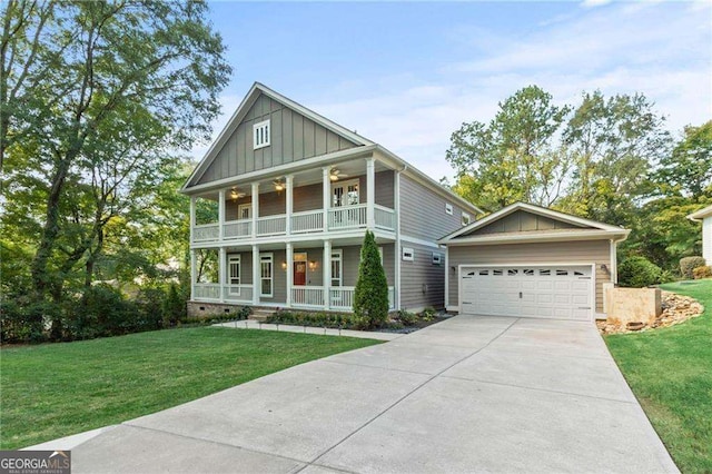 435 Webb Dr, Norcross, GA 30071 - greek revival inspired property with board and batten siding, a front yard, a balcony, a porch, and driveway