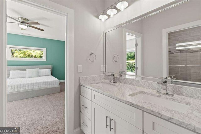 435 Webb Dr, Norcross, GA 30071 - full bathroom featuring a sink, double vanity, and a ceiling fan