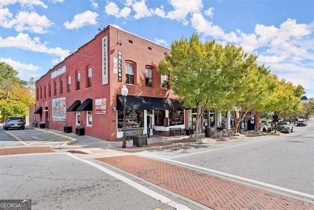 435 Webb Dr, Norcross, GA 30071 - view of building exterior featuring uncovered parking