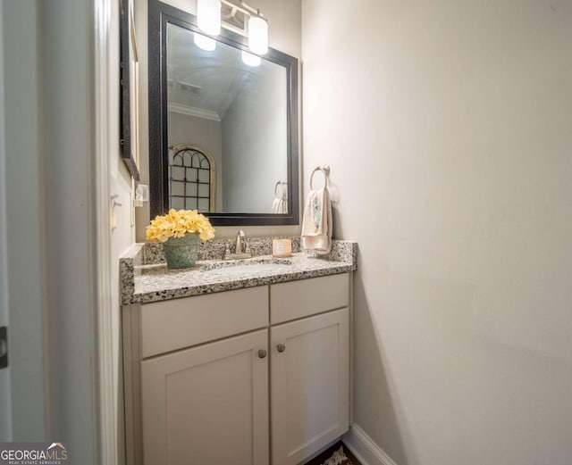13 Jamilee Cv, Cartersville, GA 30120 - bathroom with crown molding, visible vents, and vanity