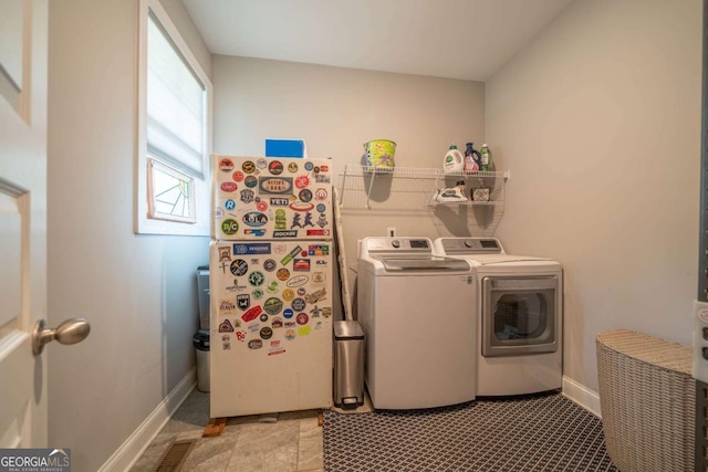13 Jamilee Cv, Cartersville, GA 30120 - laundry area with laundry area, baseboards, and separate washer and dryer