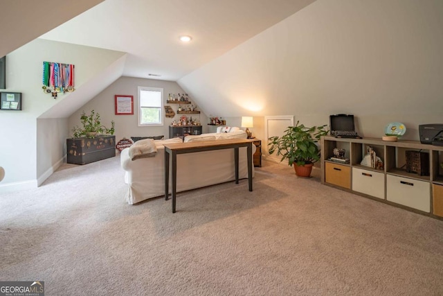 13 Jamilee Cv, Cartersville, GA 30120 - living area featuring vaulted ceiling, baseboards, and light carpet