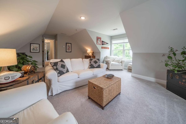 13 Jamilee Cv, Cartersville, GA 30120 - carpeted living room featuring visible vents, baseboards, and lofted ceiling