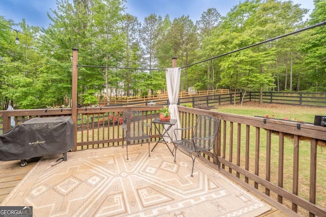 13 Jamilee Cv, Cartersville, GA 30120 - deck featuring a grill, a lawn, and a fenced backyard