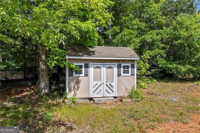 4368 Magnolia Bay Ln, Snellville, GA 30039 - view of shed featuring fence