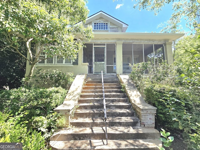 863 Boulevard, Macon, GA 31211 - view of front of home with a sunroom and stairs