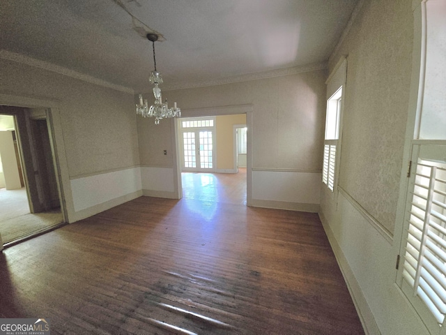 863 Boulevard, Macon, GA 31211 - unfurnished dining area with an inviting chandelier, ornamental molding, and wood finished floors