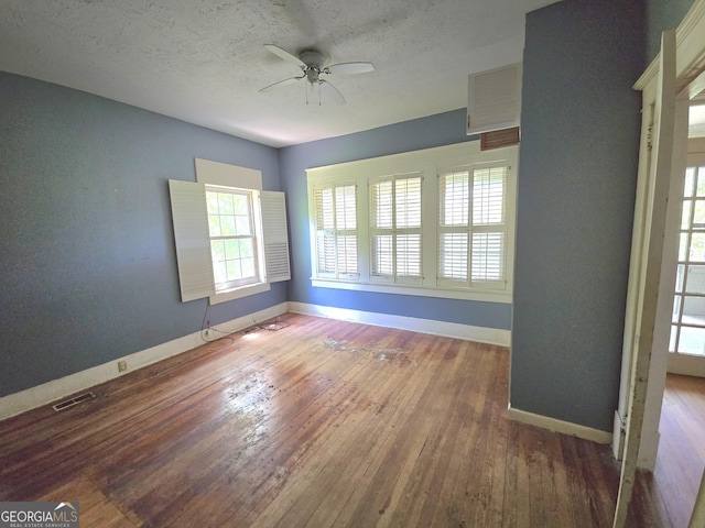 863 Boulevard, Macon, GA 31211 - unfurnished room with visible vents, hardwood / wood-style floors, baseboards, and ceiling fan