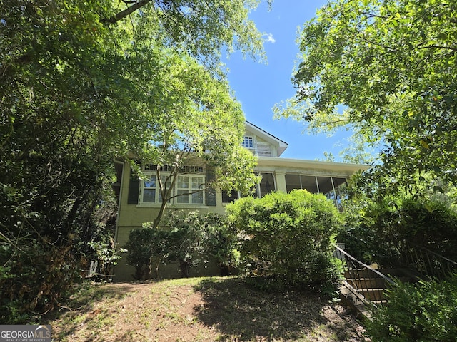 863 Boulevard, Macon, GA 31211 - view of side of home featuring a sunroom