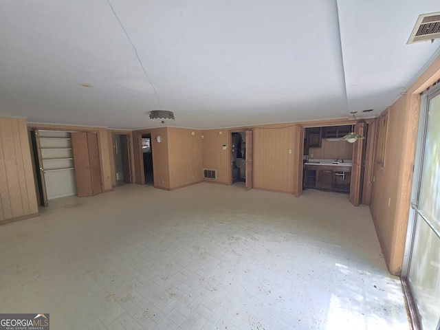 863 Boulevard, Macon, GA 31211 - below grade area with light floors, visible vents, and wood walls
