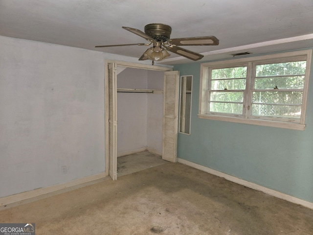 863 Boulevard, Macon, GA 31211 - unfurnished bedroom featuring a closet, baseboards, ceiling fan, visible vents, and carpet floors