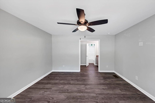 212 Lake Forest Dr, Acworth, GA 30102 - empty room featuring ceiling fan and dark wood-style floors