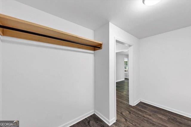212 Lake Forest Dr, Acworth, GA 30102 - spacious closet with dark wood finished floors
