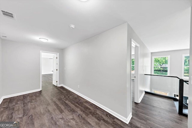 212 Lake Forest Dr, Acworth, GA 30102 - spare room with dark wood-style flooring and a smoke detector