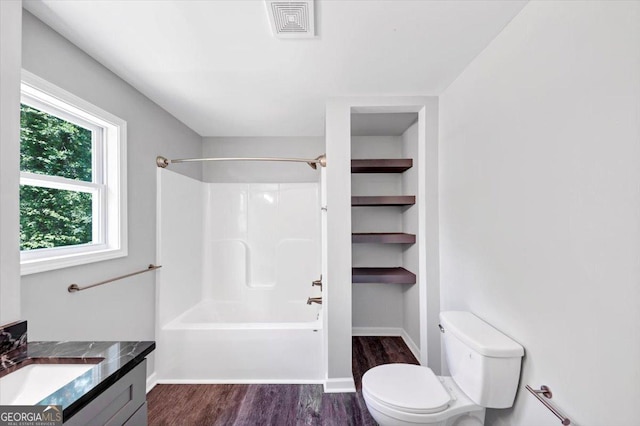 212 Lake Forest Dr, Acworth, GA 30102 - full bath with wood finished floors, vanity, and washtub / shower combination