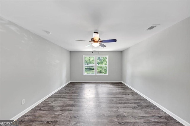212 Lake Forest Dr, Acworth, GA 30102 - unfurnished room with a ceiling fan and dark wood-type flooring