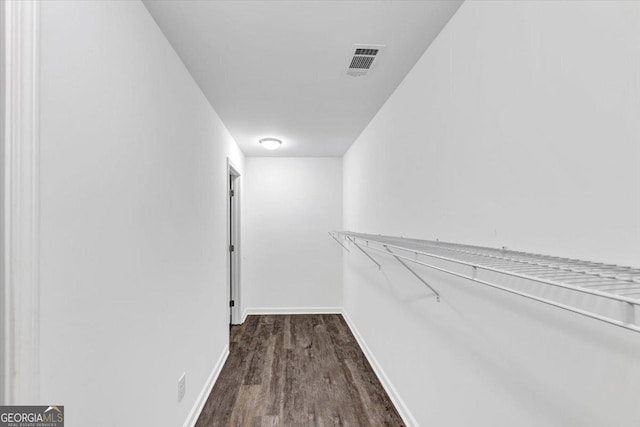 212 Lake Forest Dr, Acworth, GA 30102 - walk in closet with dark wood-type flooring