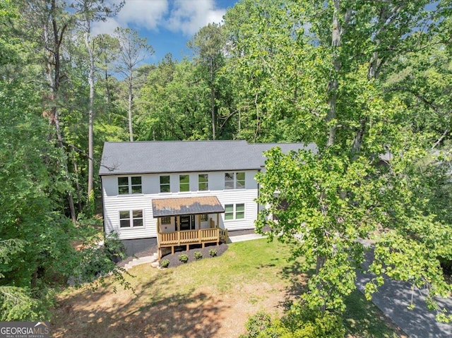 212 Lake Forest Dr, Acworth, GA 30102 - back of house featuring roof with shingles and a lawn