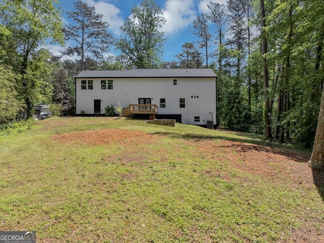 212 Lake Forest Dr, Acworth, GA 30102 - rear view of house with a wooden deck and a yard