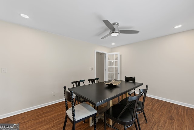 dining area with baseboards, recessed lighting, ceiling fan, and dark wood-type flooring