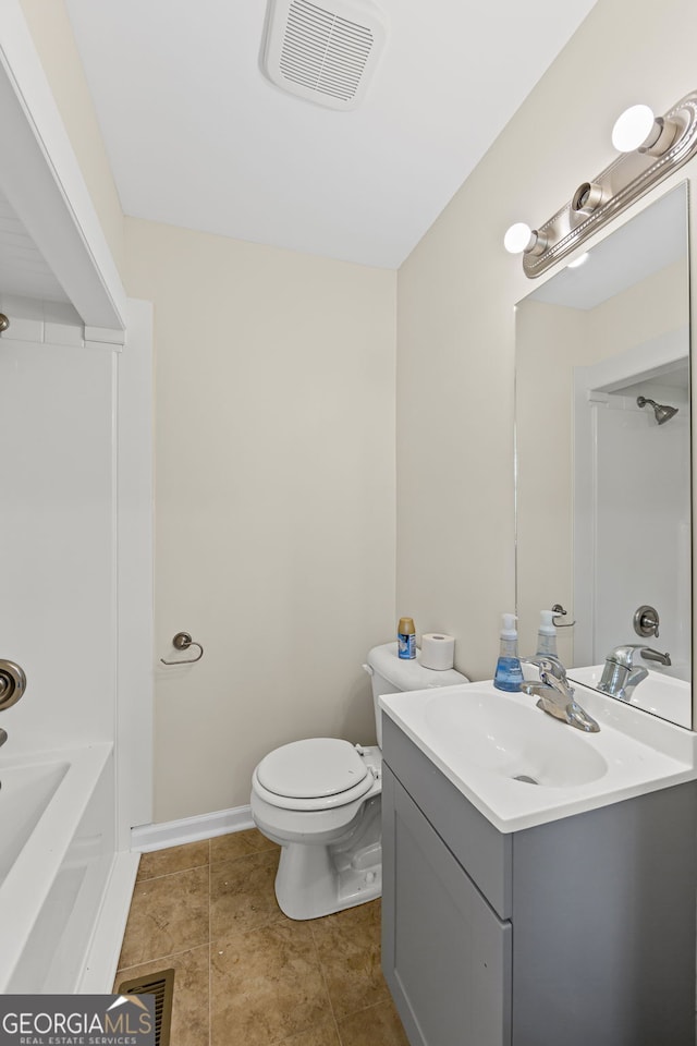 bathroom with tile patterned floors, toilet, visible vents, and vanity