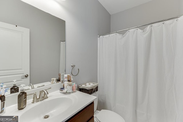 6438 Hickory Branch Dr, Hoschton, GA 30548 - bathroom featuring vanity and a shower with shower curtain