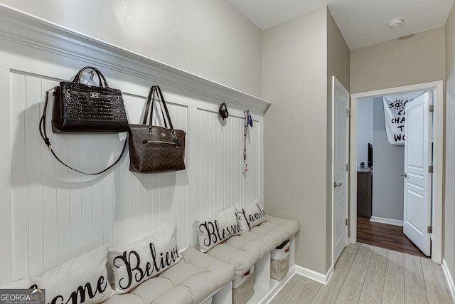 6438 Hickory Branch Dr, Hoschton, GA 30548 - mudroom with light wood-type flooring and baseboards