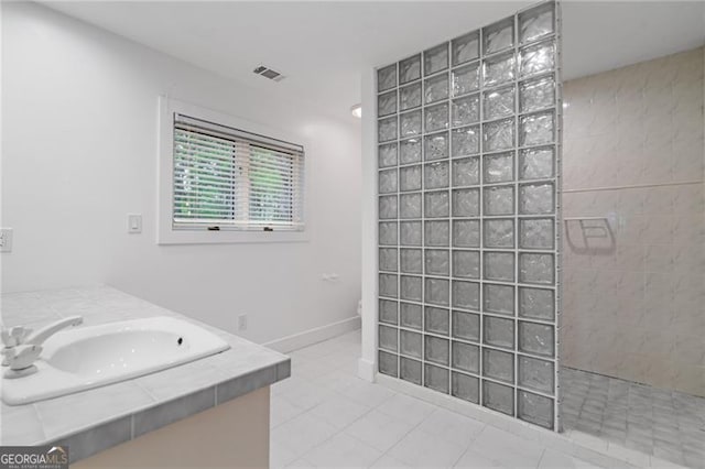111 Wood Fern Knl, Jasper, GA 30143 - full bath with vanity, a walk in shower, visible vents, and tile patterned flooring