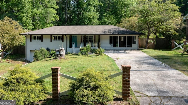 3627 Groovers Lake Rd, Lithia Springs, GA 30122 - ranch-style house featuring a porch, driveway, and brick siding
