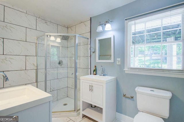 3627 Groovers Lake Rd, Lithia Springs, GA 30122 - full bath with vanity, a shower stall, baseboards, and toilet