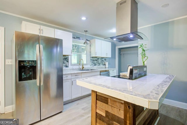 3627 Groovers Lake Rd, Lithia Springs, GA 30122 - kitchen featuring appliances with stainless steel finishes, island exhaust hood, a sink, white cabinetry, and light wood finished floors