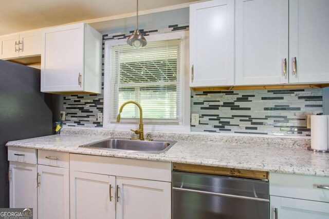 3627 Groovers Lake Rd, Lithia Springs, GA 30122 - kitchen featuring stainless steel dishwasher, a sink, tasteful backsplash, white cabinetry, and light stone counters