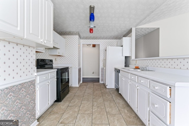 kitchen featuring black range with electric cooktop, dishwasher, white cabinets, and a sink
