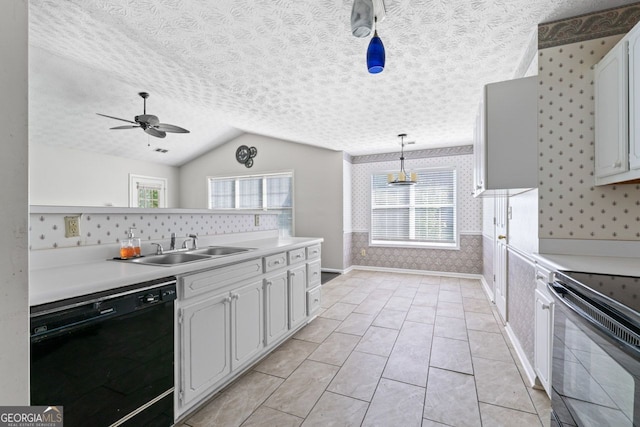 kitchen featuring a sink, wallpapered walls, ceiling fan, black appliances, and vaulted ceiling