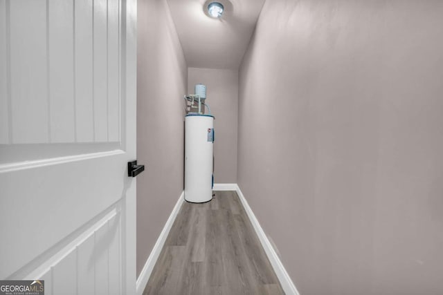 220 Makers Way, Dawsonville, GA 30534 - hall with water heater, baseboards, and wood finished floors