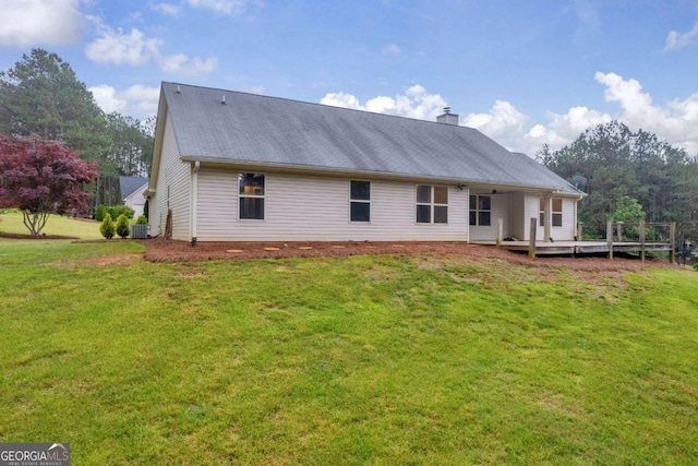 220 Makers Way, Dawsonville, GA 30534 - rear view of property with a yard, a deck, central air condition unit, and a chimney