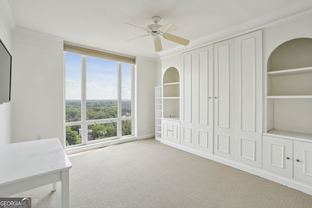 3475 Oak Valley Rd NE Unit 2060, Atlanta, GA 30326 - interior space featuring ornamental molding, ceiling fan, and carpet floors