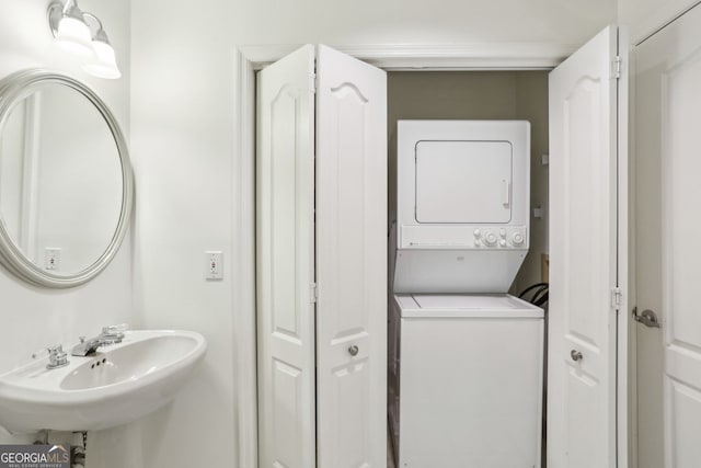 3475 Oak Valley Rd NE Unit 2060, Atlanta, GA 30326 - bathroom with stacked washer and dryer and a sink