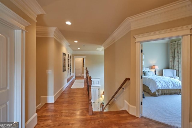 1345 Cashiers Way, Roswell, GA 30075 - hallway with an upstairs landing, ornamental molding, wood finished floors, and recessed lighting