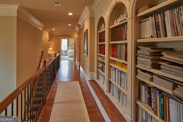 1345 Cashiers Way, Roswell, GA 30075 - hallway with ornamental molding, wood finished floors, built in features, and recessed lighting