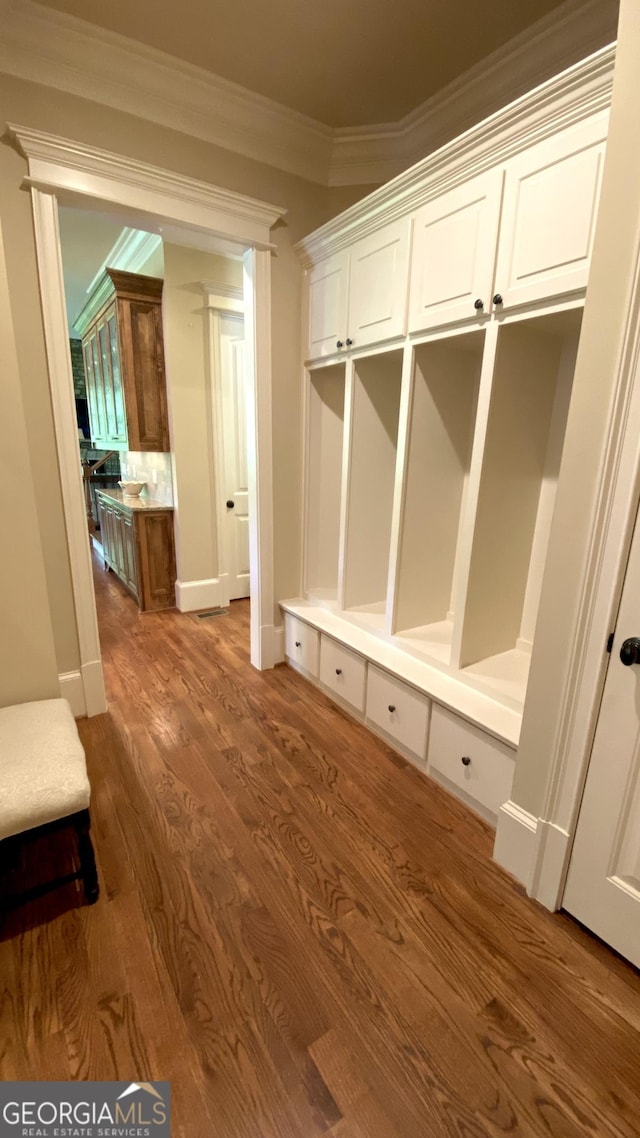 1345 Cashiers Way, Roswell, GA 30075 - mudroom featuring wood finished floors and crown molding