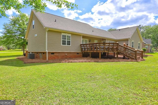 back of house with central AC unit, crawl space, a wooden deck, and a lawn