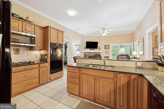 6125 Fouts Mill Rd, Douglasville, GA 30135 - kitchen featuring light tile patterned floors, a sink, ceiling fan, backsplash, and black appliances