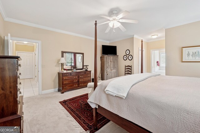 6125 Fouts Mill Rd, Douglasville, GA 30135 - bedroom with ensuite bathroom, ornamental molding, light carpet, a ceiling fan, and baseboards