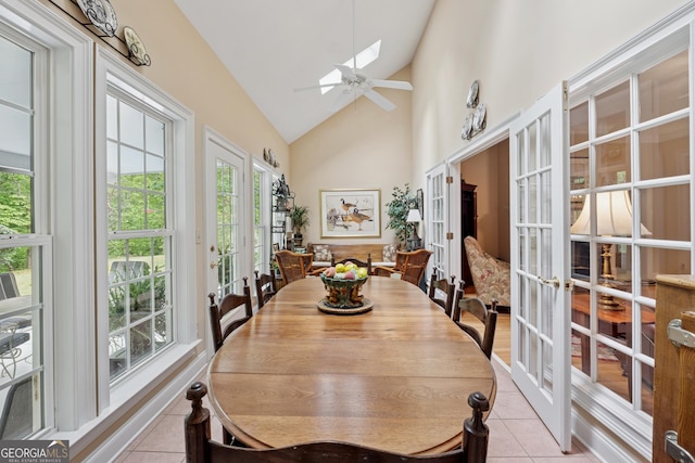 6125 Fouts Mill Rd, Douglasville, GA 30135 - dining room with light tile patterned floors, french doors, a ceiling fan, and high vaulted ceiling