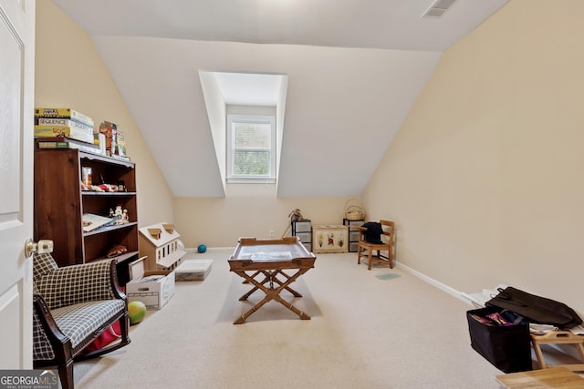 6125 Fouts Mill Rd, Douglasville, GA 30135 - sitting room with carpet flooring, vaulted ceiling, baseboards, and visible vents